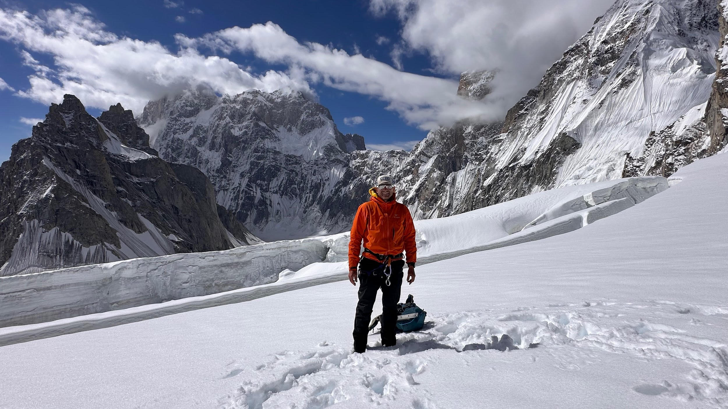 Guide standing in a high mountain valley